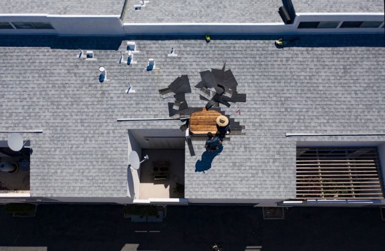 Roof repair in progress, in Woodbury